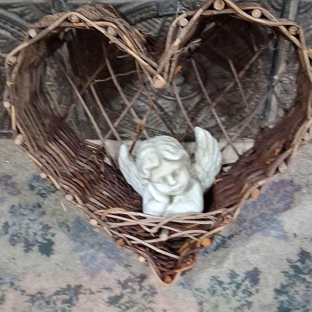 Vintage rustic willow 14" W. heart shaped wall basket.